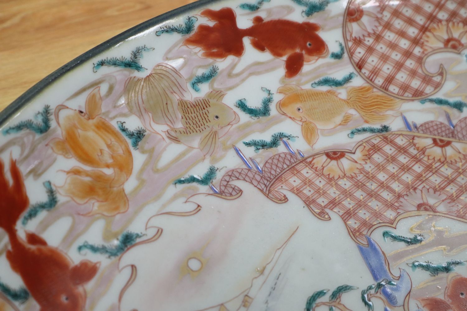 A large Kutani charger, Edo period, diameter 56cm